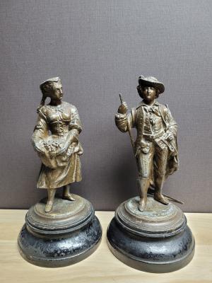 statuettes of farmer and farmer's wife