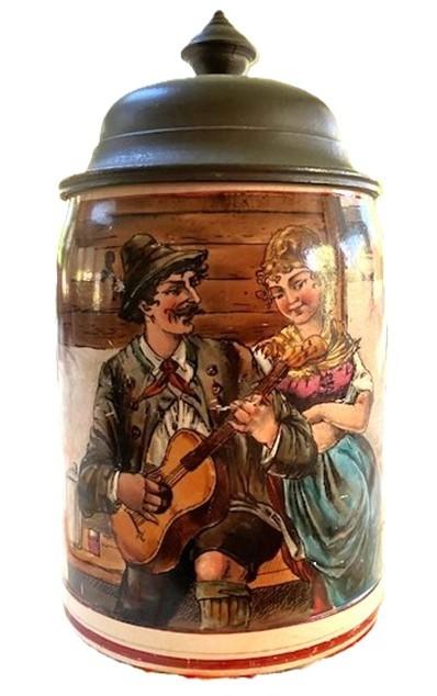 Man playing guitar for a woman