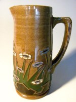 Pitcher wirh floral decorations